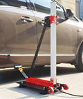 Pneumatic Powered Sheet Metal Dent Pulling Tower Kit for Auto Body Shaping and Alignment next to a car