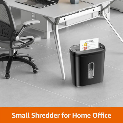 Built Tough Cross Cut Shredder For Paper And Credit Cards With Bulletproof P Four Security And Zero Drama Auto Shut Off In Sleek Black beside office chair.