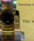 Close-up of 4 Inch Sliding Door Rollers V Groove Wheels With Welded Brackets Double Bearing, showing two comparison wheels.