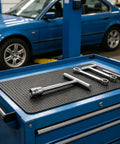 Reliable Heavy Duty Paintless Dent Puller Kit For Auto Hoods And Trunk Lids Straighten Sheet Metal Dings Effortlessly on toolbox.