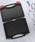 Portable Plastic Toolbox With Grip Handle, Heavy Duty Hard Shell Organizer For Mechanics, empty black toolbox open on a gray surface.