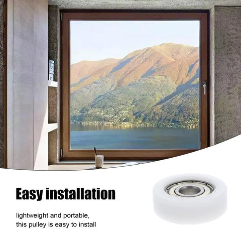 Top Shelf Set Of 4 Sliding Door And Window Pulleys Zero Sweat Replacement Nylon Guide Rollers Easy Install close-up of a guide roller and a window.