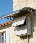 Heavy Duty Electric Vehicle Charging Station Roof Cover with polycarbonate awning, mounted above a wall box for rain protection.