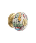 Kick Up Your Space With These Dope Handmade Ceramic Dresser Knobs Featuring A Vibrant Multicolor Leaf Pattern Perfect ForKitchen Cupboards Bedroom Drawers And Furniture Hardware Including Four Sturdy Pulls For Easy Room Refreshes, close-up view of a handmade ceramic knob with multicolor leaf design.