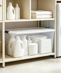 Ginormous 105 Quart Clear Storage Bin With Blue Secure Latch Heavy Duty Plastic Tote For Bulky Seasonal Gear And Bedding Keeps Your Space Spiffy And Makes Organization A Breeze, storing laundry supplies below shelves.