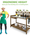 Man standing by Outdoor Fir Wood Potting Bench With Metal Table Top Drawer Large Bottom Shelf And Open Shelf Garden Work Station