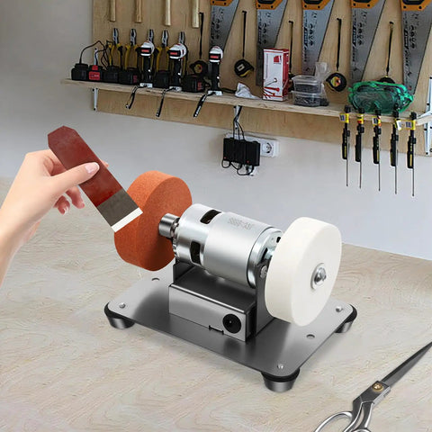 Badass 96W Mini Belt Sander And Bench Grinder With Variable Speed Control For Metal Work And Knife Sharpening compact desktop tool in use.