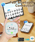 Bluetooth Sticker Printer Mini Portable Sticker Maker With 3 Roll Paper Inkless Thermal Printing For iPhone Notes And Journals DIY Crafts And Kids Gift On The Go shown in use with phone and tablet displaying app interface.