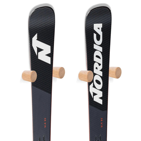 Solid Wood Ski Wall Mount Rack That Shows Off Your Boards As Dope Home Decor While Saving Valuable Floor Space And Keeping Your Alpine Gear Looking Sharp And Well Organized Year Round, displaying two skis on wooden pegs.