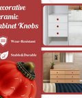 Set Of Eight Red Ceramic Pumpkin Knobs With Heavy Duty Zinc Base And Shiny Embossed Glaze For Vintage Cabinets And Kitchen Drawers, displayed on furniture.
