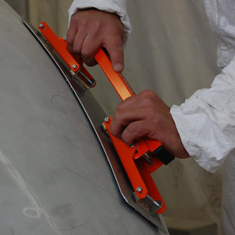 Using Flexisander Hand Held Flexible Sanding Block for Curved and Flat Surfaces on a large surface, 22 x 4.5 Inches size.