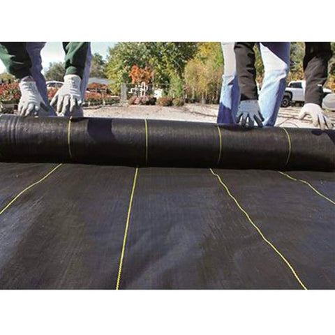People installing Heavy Duty Weed Barrier Fabric 3.2 Oz 6 X 300 Feet Roll For Greenhouse Floors Garden Rows Raised Beds Yard Gardening And Outdoor Landscape Protection Durable