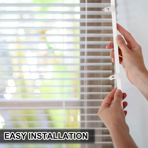 Hands installing a white shutter connector pin into window blinds, showcasing 20 Pack Window Blind Repair Sliders And Shutter Connector Pins With 3.25 Inch Center Spacing Heavy Duty Build For A Quick Fix And Hassle Free Operation.