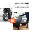 Rugged Heavy Duty Tire Dolly With Slick 360 Swivel Wheels Hella Tough Wheel Cart For Cars Trucks And Atvs Easy Roll helping lift a tire.