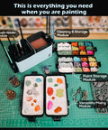 Top view of Portable All In One Modular Painting Station With Wet Palette, Brush Cleaners, Holders And Lid For Miniatures And Warhammer Hobbyists with tools and paints on table.