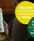 Person holding bottle of Concentrated Indoor Outdoor Insect Control For Fleas Roaches And Ants 32 oz with safety notices