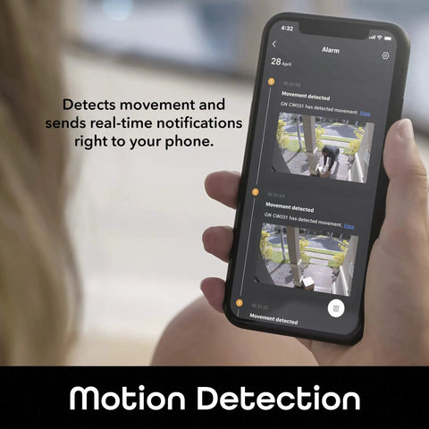Hand holding smartphone showing Freebird 2K Wireless Security Camera Battery Powered Outdoor Camera Motion Detection alerts.