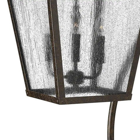 Close-up of Extra Large Four Light Outdoor Wall Lantern With Built Tough Traditional Scroll Frame And Rust Proof Aged Zinc Finish.