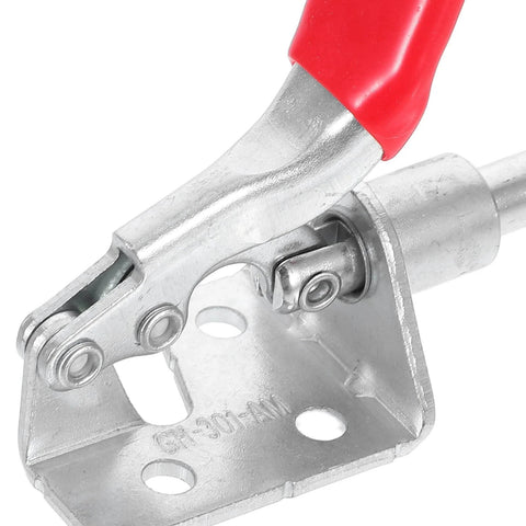 Close-up of heavy-duty horizontal push pull toggle clamps quick release welding table clamps with red handle, metal construction