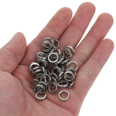 M6 Split Lock Washers 304 Stainless Steel 300 Piece Pack in hand, showcasing individual spring hardware for anti loosening use.