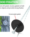 Heavy-Duty Galvanized Landscape Stakes With Gasket Caps, 6.3 Inch Garden Spikes For Securing Weed Barriers Artificial Lawn Patio Rugs And More, 50 Pack Durable Steel Garden Fixers shown with circular plastic gasket for strong fixation.