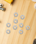 M6 Serrated Spring Washers Locking Stainless Steel 40 Piece Set placed on wood surface, showing rust resistant locking edge for secure use.