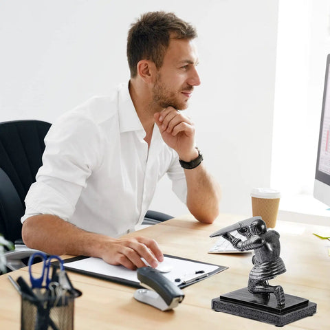 Businessman using computer with Knight Pen Holder With Two Pens And Resin Desk Organizer For Men Funny Executive Pen Stand on desk