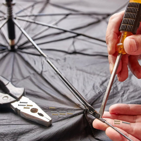Repairing a folding parasol with Heavy Duty Umbrella Skeleton Rivets With Willow Nails For Quick Shutter And Frame Repair.