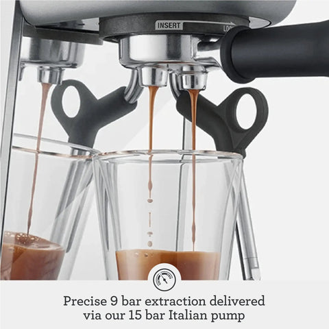 Next Level Semi Automatic Espresso Machine With Auto Frothing Wand For Barista Level Microfoam And Flawless Latte Art At Home In Sleek Black Stainless Steel Build Compact Kitchen Setup For Smooth Shots And Rich Crema Daily, close-up of espresso extraction.