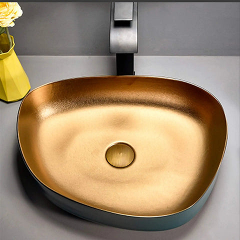 Heavy Duty Rectangular Vessel Sink Installed Above Counter From Porcelain Ceramic With A Sleek Closed Glaze That Handles Scratches And Stains Like A Champ And Keeps Your Lavatory Spick And Span With Zero Hassle When Upgrading Your Vanity Setup Today, gold and blue ceramic basin with round drain.