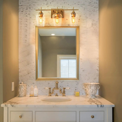 Three Light Bronze Vanity Light Fixture With Glass Shade Over Mirror Wall Sconce for bathroom with modern decor and easy mount