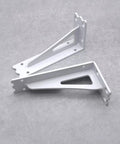 Top Notch 2 Pack Wall Mounted Shelf Brackets Heavy Duty Metal Triangle Supports Built Tough For Wood Boards Quick Install Includes Full Hardware White Finish, shown in white finish on gray surface.