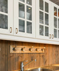 Built Tough Heavy Duty Antique Brass Cabinet Pulls 3 Inch Drawer Handles 10 Pack For Kitchen on white cabinets.