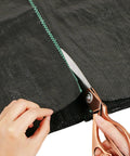 Heavy Duty Weed Barrier Landscape Fabric 3ft x 10ft Ground Cover being cut along green guide line for outdoor gardens