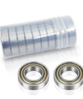 10 Pack 6700 Zz Miniature Ball Bearings 10X15X4Mm Ultra Thin shown with storage tube and two chrome steel bearings.