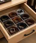 Keep Your Gear Legit With This Stackable Acrylic Belt Organizer featuring nine roomy compartments for belts in a drawer.