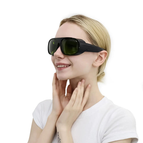 Pro Grade Laser Safety Glasses For Hair Removal To Shield Your Peepers From 755 808 And 1064 Nm Waves, worn by a smiling woman.