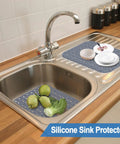 Two Pack Silicone Sink Protector Mats For Kitchen Sinks No Slip Scratch Resistant Grid Mats For Rear Drain Gray 13.58 X 11.6 Inches Keeps Counters Safe And Scratch Free shown on a kitchen sink