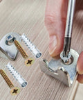 Hand using screwdriver with 40 Pack Drywall Anchor Screw Kit for Hollow and Wood Walls Heavy Duty Rust Proof Steel Expansion Anchors