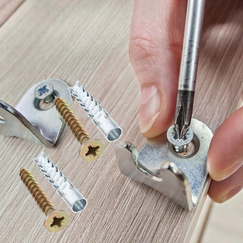 Hand using screwdriver with 40 Pack Drywall Anchor Screw Kit for Hollow and Wood Walls Heavy Duty Rust Proof Steel Expansion Anchors