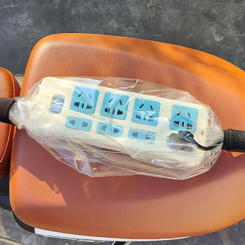 No Sweat EV Charger Cover For Your Ride Rock Solid Waterproof Housing Keeps Your Plug In Gear Safe From Elements Universal Fit For Outdoor Charging Boxes New Energy Cars on a seat.