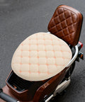 Hella Cozy Beige Plush Motorcycle Seat Cover With Super Warm Winter Fluffy Padding For Riders Seeking A Smooth Ride And Dope Dirt Bike Accessories That Look Clean And Feel Amazing All Day Long on a brown scooter.