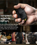 Close-up of Wearable Bluetooth V5.3 Clip-On Speaker With 30 Hour Battery Life in hand, highlighting clip-on feature and compact size.