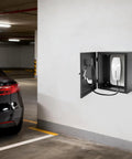 Hella Tough Wall Mounted EV Charger Outdoor Enclosure Rugged Weatherproof Protection Shell in black garage setting.