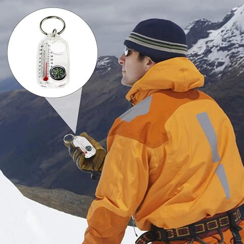 Trail Ready Hiking Compass Keychain Tool For Quick Navigation in use by outdoor climber