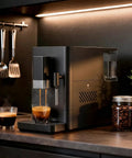 Total Game Changer Automatic Espresso Machine With Built In Grinder 20 Bar Coffee Maker brewing espresso on kitchen counter.