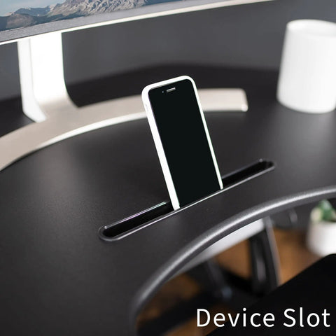 Phone in slot on 43 Inch Corner Electric Height Adjustable Desk Riser For Dual Monitors, VE Series Black Finish