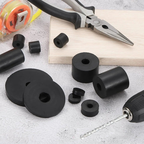 Four Piece Thick Rubber Spacers With Two Inch Outer Diameter Half Inch Inner Bore And Thirteen Sixteenths Thickness made for anti vibration machine mounts.