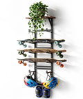 Multi Deck Skateboard Rack Wall Mount Display Hanger With Solid Wood Top Shelf And Rubber Grip Pads To Safely Store Your Stash And Keep Your Boards Looking Gnarly Always, holding three boards and two helmets.