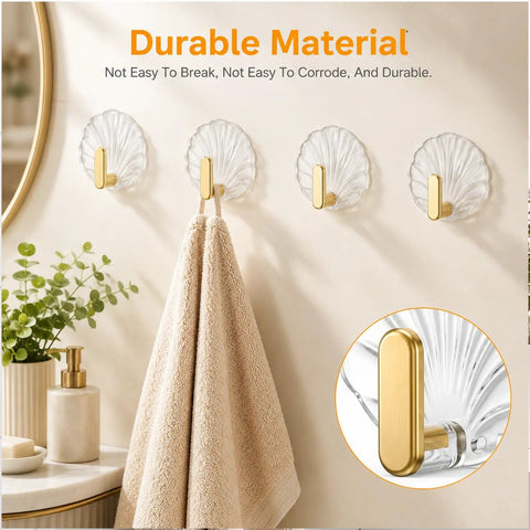 10 Pack Invisible Adhesive Wall Hooks With Chic Gold Shell Design Waterproof Heavy Duty Strong Hold For Bathroom Shower Kitchen Organization Easy Install Straight Up Game Changing Setup, close-up on hooks holding towels.